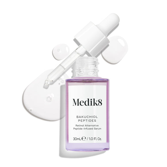 A purple glass dropper bottle of Bakuchiol Peptides serum, with its dropper removed. A swirl of the serum is shown, emphasising the product's texture.-10
