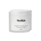 Medik8 Blemish Control Pads jar stands against a clean white background. Text identifies the product as  Ready-to-Go Clarifying Pads with 2% Salicylic Acid  containing 60 pads.