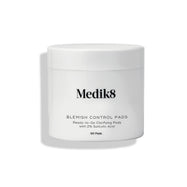 Medik8 Blemish Control Pads jar stands against a clean white background. Text identifies the product as  Ready-to-Go Clarifying Pads with 2% Salicylic Acid  containing 60 pads.