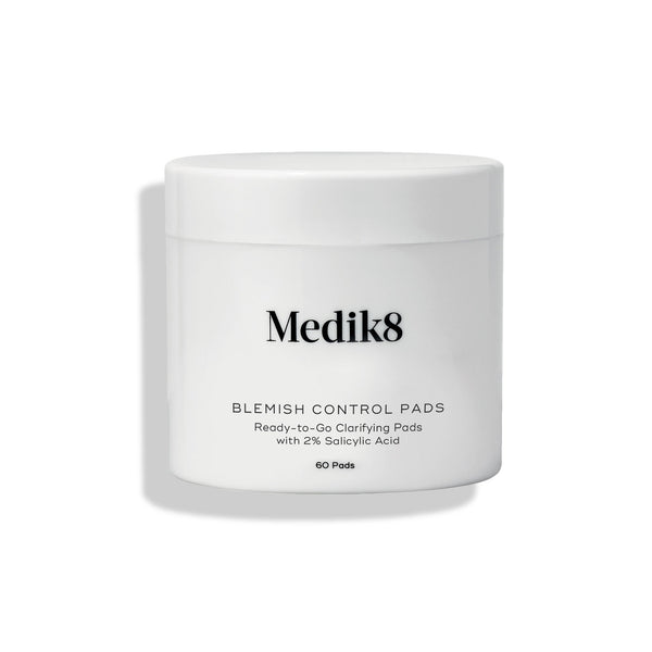 Medik8 Blemish Control Pads jar stands against a clean white background. Text identifies the product as  Ready-to-Go Clarifying Pads with 2% Salicylic Acid  containing 60 pads.