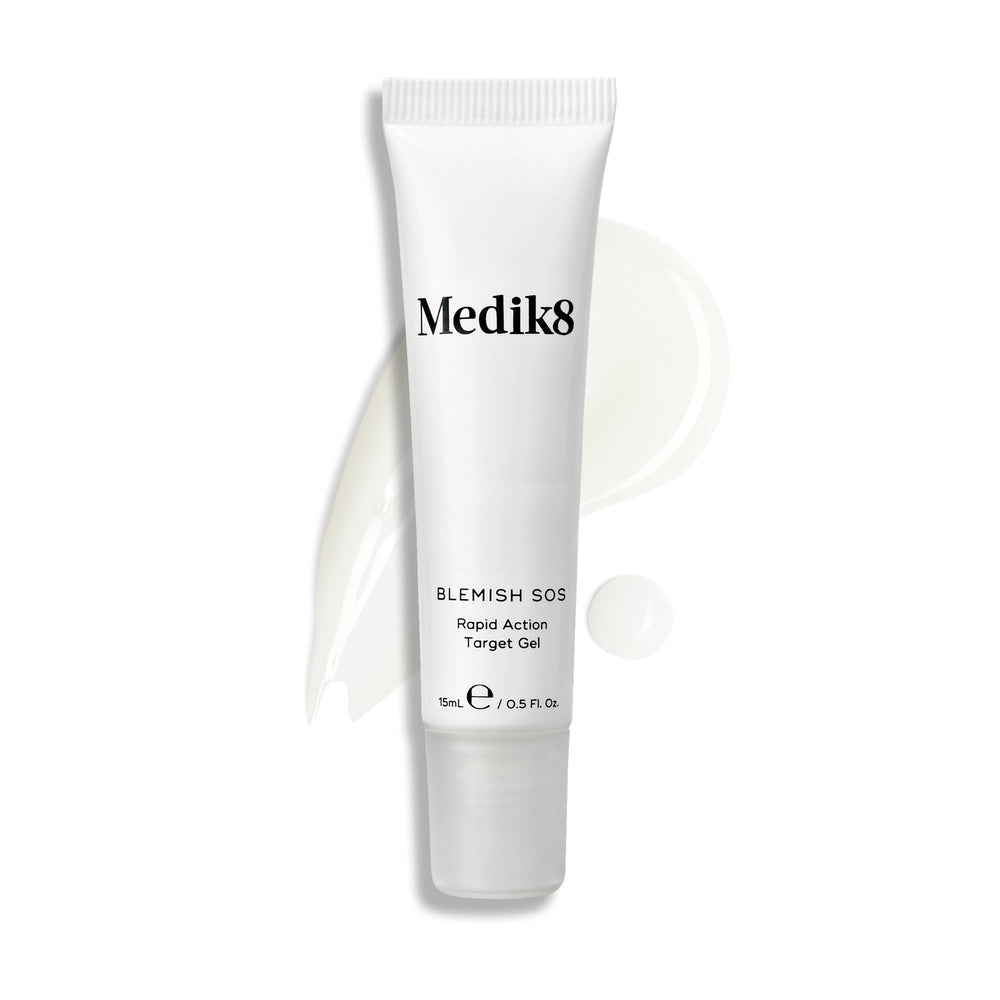 A tube of Blemish SOS stands upright, with a wavy swatch of light-colored gel and a droplet beside it.