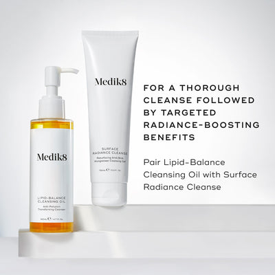 Lipid-Balance Cleansing Oil bottle stands beside a tube of Surface Radiance Cleanse. Text recommends pairing the two for a  thorough cleanse followed by targeted radiance-boosting benefits .