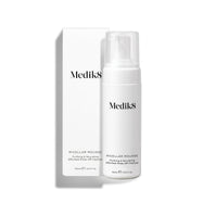 Medik8 Micellar Mousse pump bottle standing next to its white packaging box on a white background. Text identifies it as a Purifying & Nourishing Effortless Rinse-Off Cleanser. 