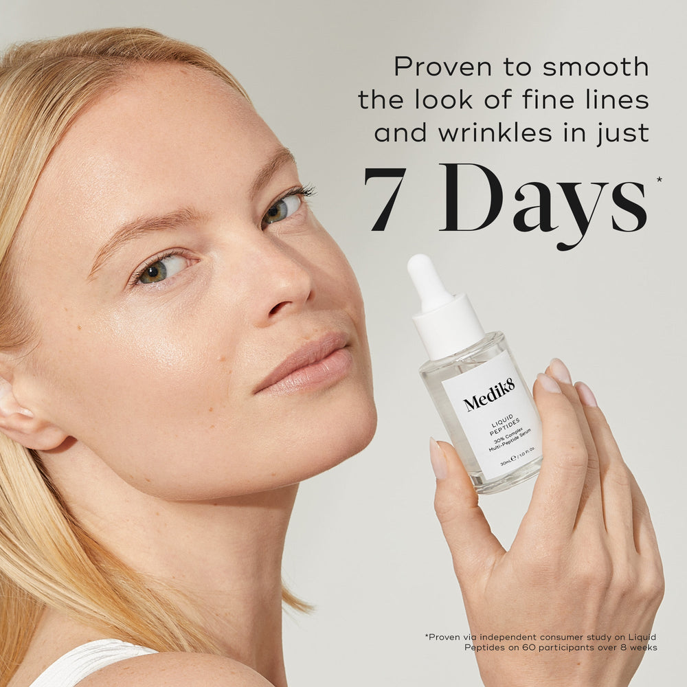 A woman holds a bottle of Liquid Peptides serum. Text on the right states,  Proven to visibly boost skin plumpness in 7 Days*.  A footnote states this is from an independent consumer study.