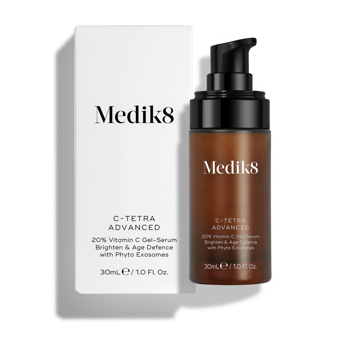 A 30mL amber pump bottle of Medik8 C-Tetra Advanced standing next to its white cardboard carton against a clean white background. Text on the bottle and carton reads ""20% Vitamin C Gel-Serum,"" ""Brighten & Age Defence,"" and ""with Phyto Exosomes.