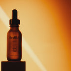 A video for Medik8 C-Tetra Luxe serum featuring an amber dropper bottle and a woman with glowing skin. Text highlights include "2x more Vitamin C than our original C-Tetra" and "14% Vitamin C in a nourishing oil." The video states it is clinically proven to instantly boost skin radiance, visibly reduce wrinkles, and reduce dark spots, with "86% agree it’s the best Vitamin C serum."